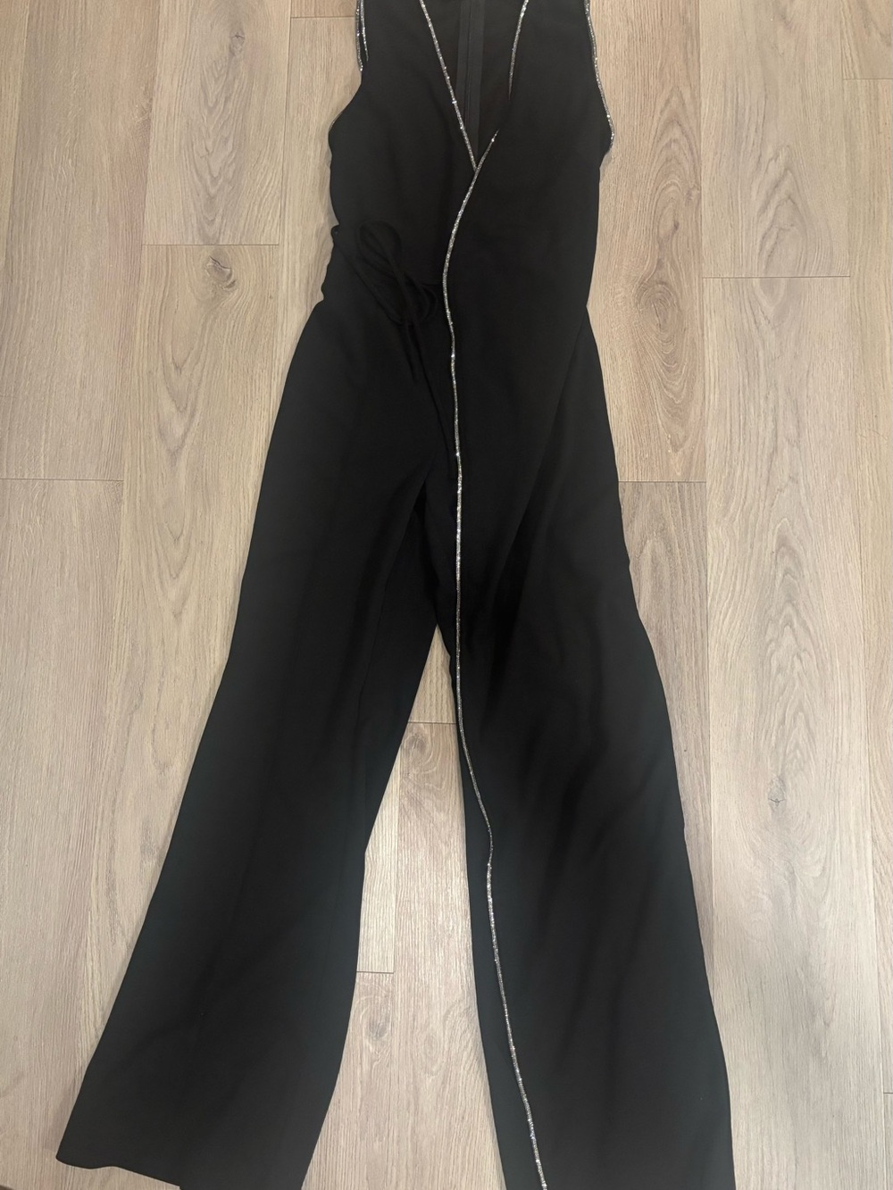 Fashion Nova Black Sleeveless Wrap Jumpsuit with Silver Trim